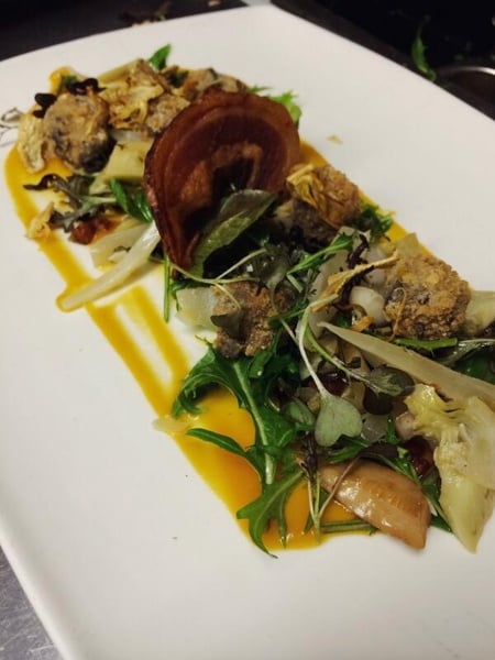 Chicken Fried Snails with Appalachian Red Corn Grits, Kale, Peas, Bacon, and Butternut Squash Puree.