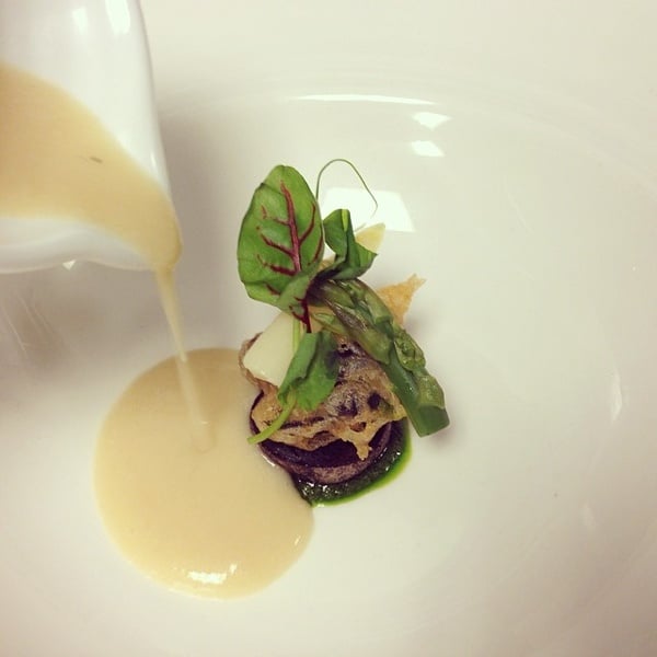 Smoked White Asparagus Soup, Wild Burgundy Snail, Purple Potato, Ramp Pistou.